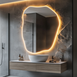 Organic LED mirror with flowing curves and soft ambient glow